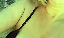 African milf shows off big tits and pussy lips on the beach