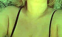 African milf shows off big tits and pussy lips on the beach