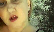 African milf shows off big tits and pussy lips on the beach