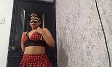 Exotic dancer warms up by spreading her legs wide open