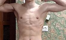 flex skinny boy in underwear showing off muscular bodybuilder moves