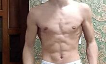 flex skinny boy in underwear showing off muscular bodybuilder moves