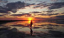 Stroll through red sunset at Elton Salt Lake