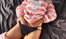 Petite Teen in Pajamas Gently Touches Small Breasts While Exploring Self to Calm Release