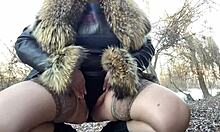 This mature busty milf pisses outdoors in stockings and dress!