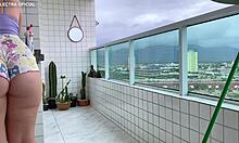 voyeur watches latina neighbor clean in shorts