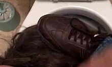 The slave felt intense pleasure as she orgasmed from the cumshot and facial in the public urinal