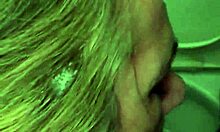 The slave felt intense pleasure as she orgasmed from the cumshot and facial in the public urinal