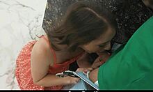 stepdaughter helps her father-in-law in the kitchen while stepmom is busy