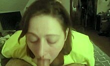 Laying on her stomach for deepthroating session