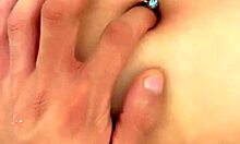 Detailed fingering of a beautiful navel with sensual touches.