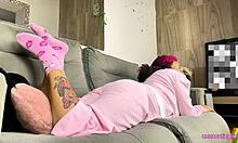 Chubby girl in pajamas farts loudly while watching TV, her big ass on display