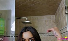 bronze-skin model enjoys a relaxing shower