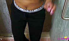 bronze-skin model enjoys a relaxing shower