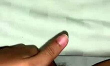 Two fingers explore inside amateur asian pussy