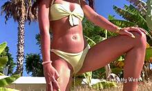 Watch this crazy 18-year-old girl pee right in her wet panties on a public beach then sunbathe like nothing happened