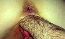 She moans as her milf pussy stretches around husband's fist.