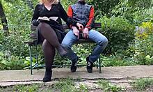 Curvy step mother satisfies step son outdoors, flashing her hairy pussy in pantyhose while giving handjob.