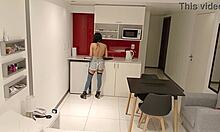 i'm the latina brunette eatin a banana in the kitchen then suckin a big cock