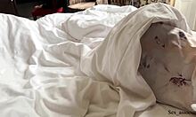 Stepmother and son share a hotel bed