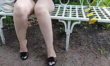 Woman in High Heels Walks Through the Park