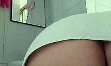 Teacher teaches how to shave properly in the bathroom