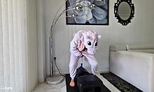 Blonde milf in unicorn costume rides sybian vibrator intensely, squirting hard.