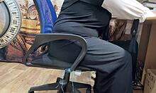 an arab woman sits alone, watching porn on her screen, her hands slowly moving to touch herself as she masturbates deeply.