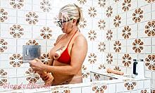 milf inserts dildo in bathroom solo