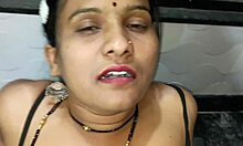 Indian couple enjoying subtle kitchen moments together