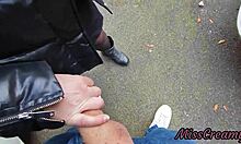 Pulling out cock between cars on public street, hot girl helps me cum riskily.