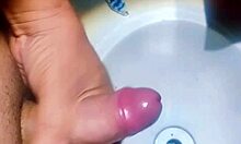 Man hidden in bathtub sink jerks off