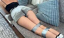 bound and teased on the countertop, moaning with pleasure