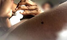 This sexy babe spreads her legs wide in her homemade setup, fingering her tight pussy with a vibrator while moaning loudly in close-up, squirting juices all over the place.