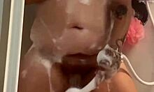 Some wet shower play with tattooed small tits