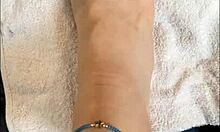 The young latina chats with her followers while displaying her bare feet