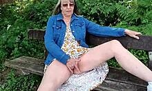 Naughty girl explores orgasm in forest woods