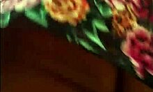 Following a mature woman on the street with skirt and thong