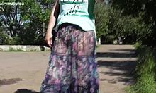 Hairy mature in transparent dress flashes outdoors