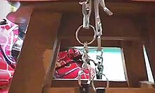 Big pussy lips dangled and stretched with weights