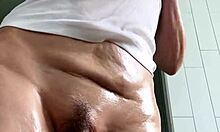 Mature Brunette Uses Baby Oil for Wet T-Shirt Striptease and Masturbation