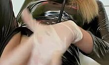 Babe In Latex Plays With Her Wet Slit