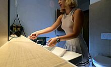 Petite blonde cheerleader flashes tits and pussy under short skirt