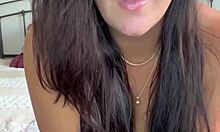 Amateur milf with huge veiny tits squirts while fucking her giant dildo.