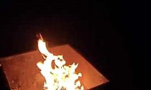 Outdoor flashing and teasing wet pussy with big dick by campfire