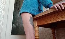 skinny brunette rubs pussy on table kitchen