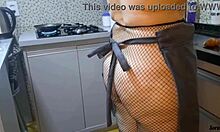 I caught my mother-in-law preparing dinner naked in the kitchen, her mature body craving a hard fuck.