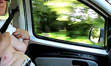 Going down the road with my tits out.