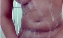 Hot young girl taking a shower in the bathroom