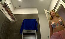 all natural cute big ass nice tits blonde college girl in the hottest lingerie shows her booty and shaved pussy in the bathroom